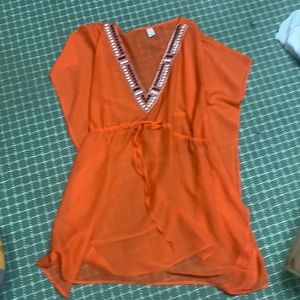 Orange sheer pool cover up
